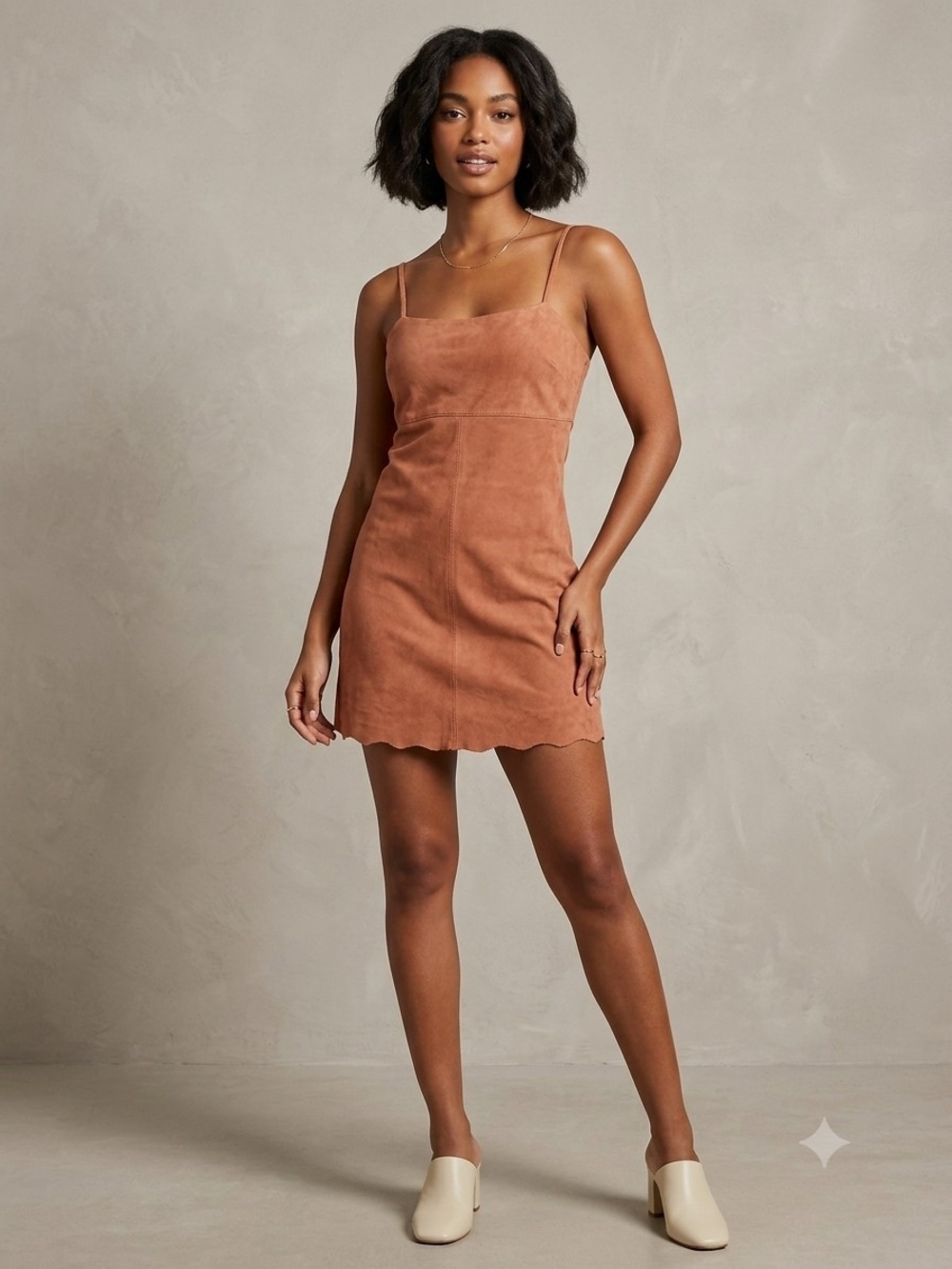 Free People short dress with straight edges in genuine leather in rust color.
